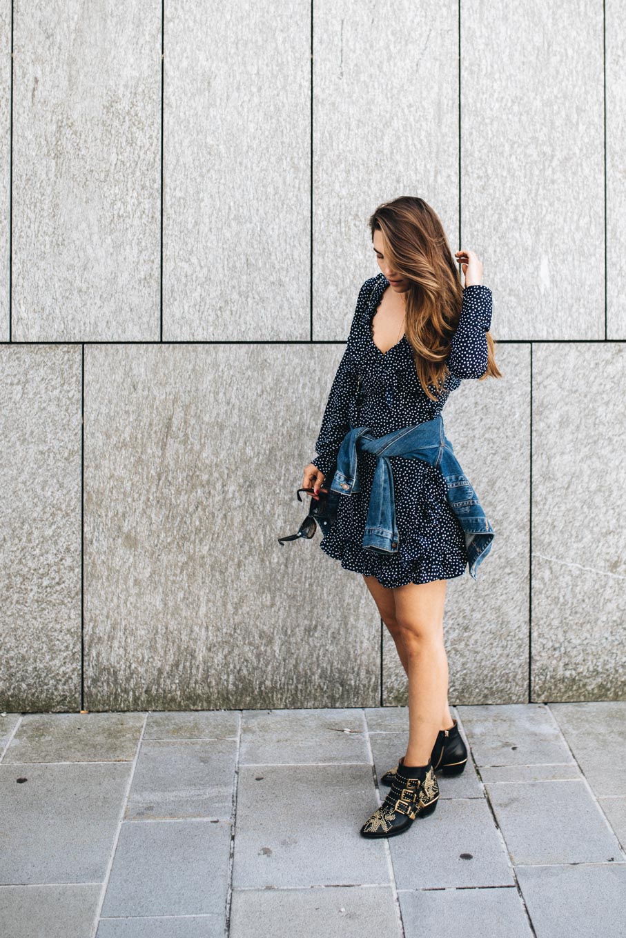 dress with denim jacket and boots